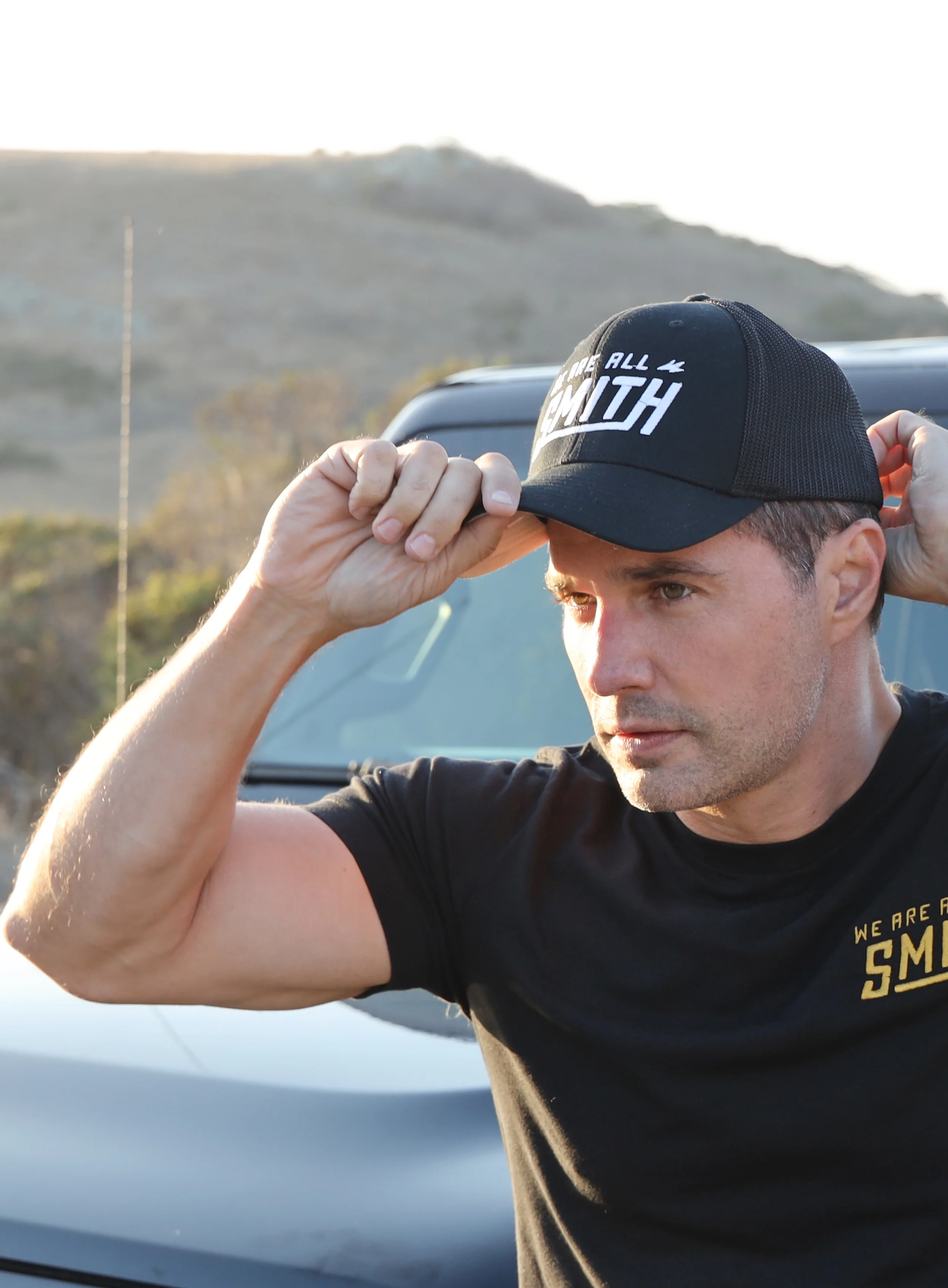 Closed-back black We Are All Smith trucker cap - Image 11