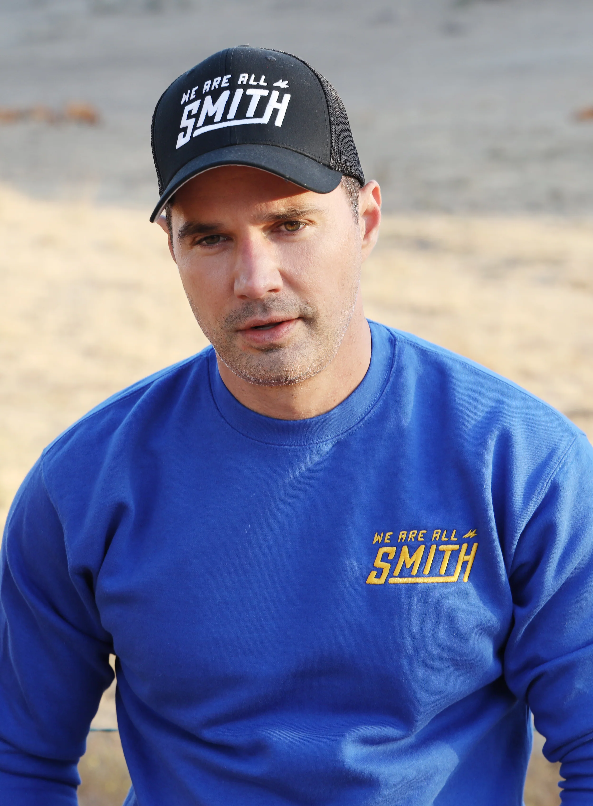 Closed-back black We Are All Smith trucker cap - Image 3