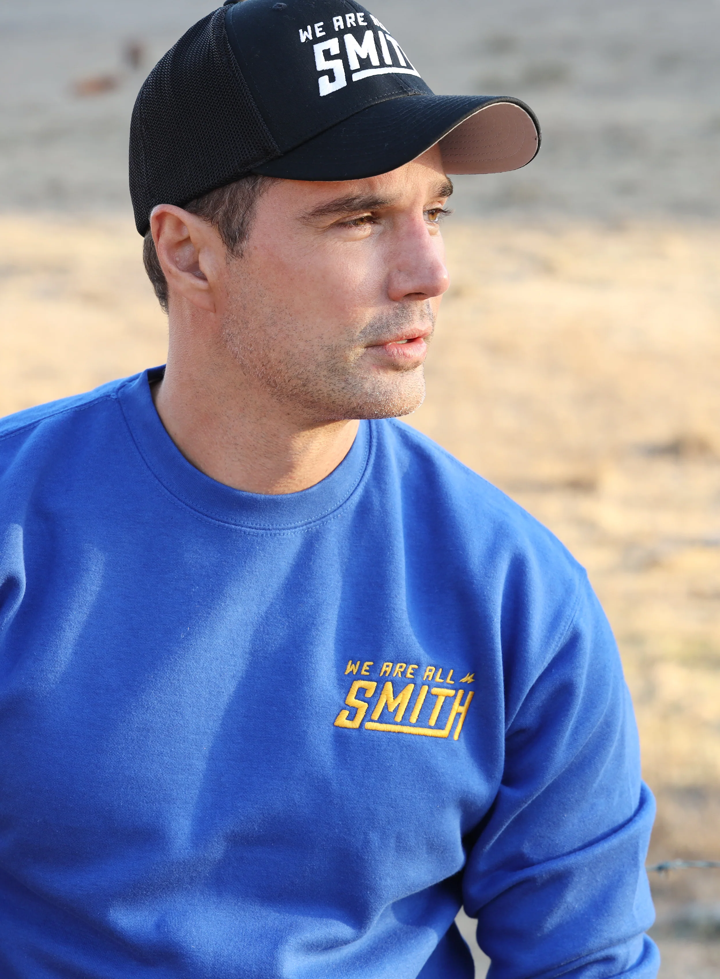 Closed-back black We Are All Smith trucker cap - Image 6