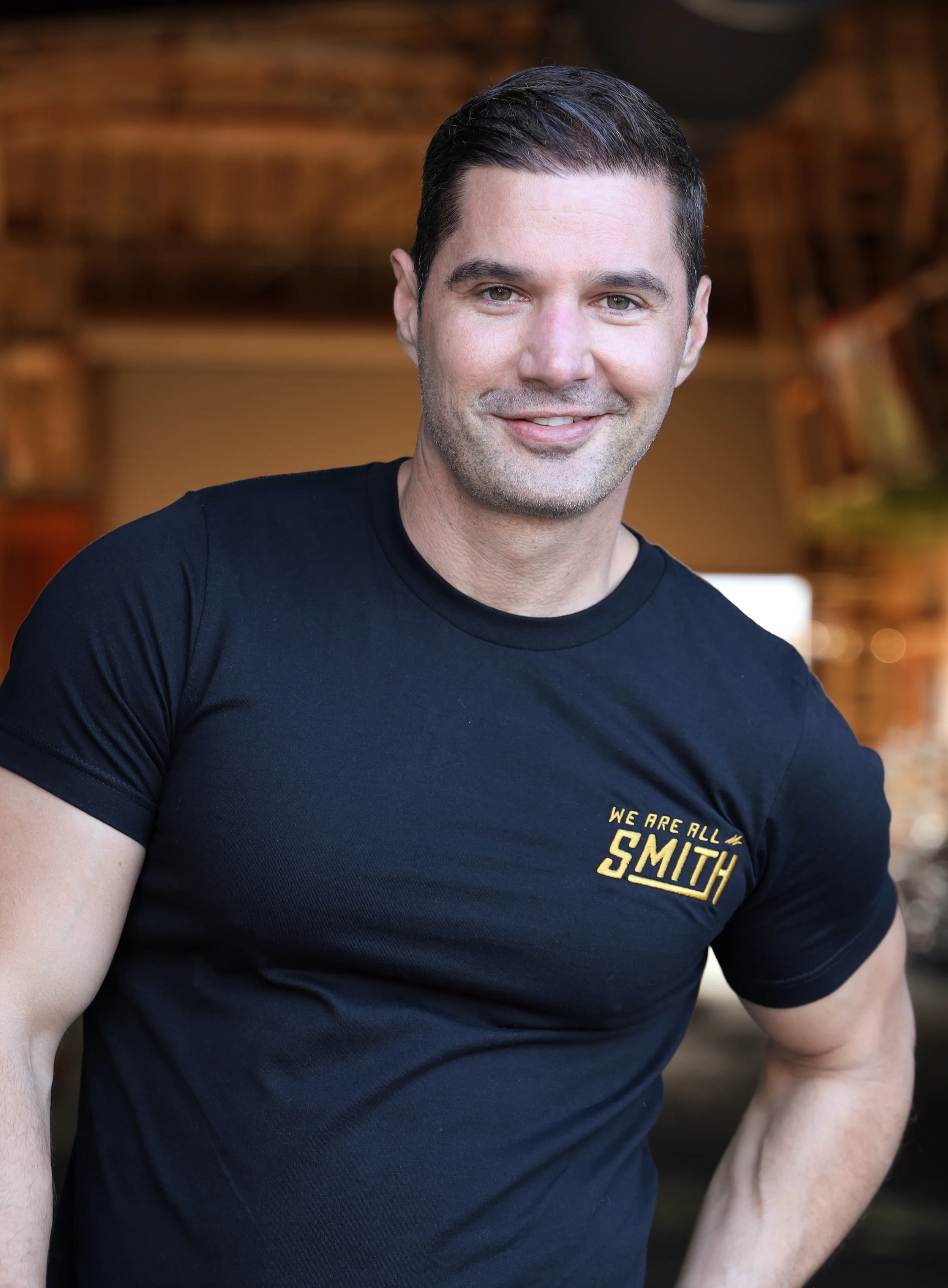 Gold We Are All Smith Embroidered Logo Black Unisex t-shirt - Image 6